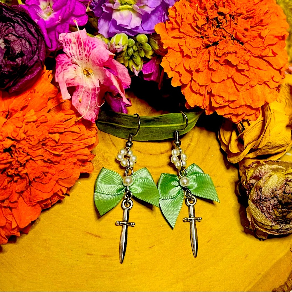 Green Skulls and Daggers. Dangle earrings from Humble County. Handmade!